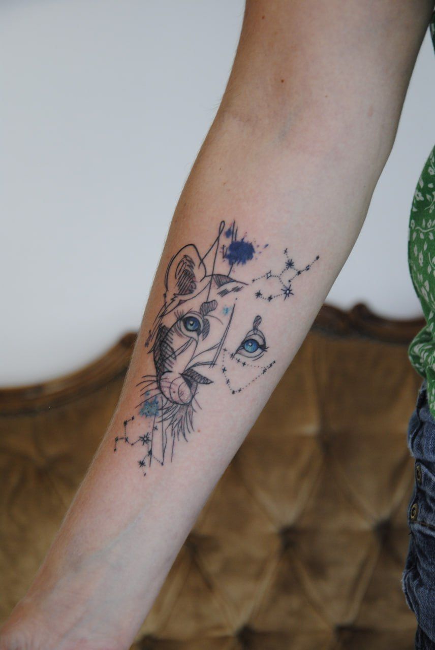 Tatouage lionne