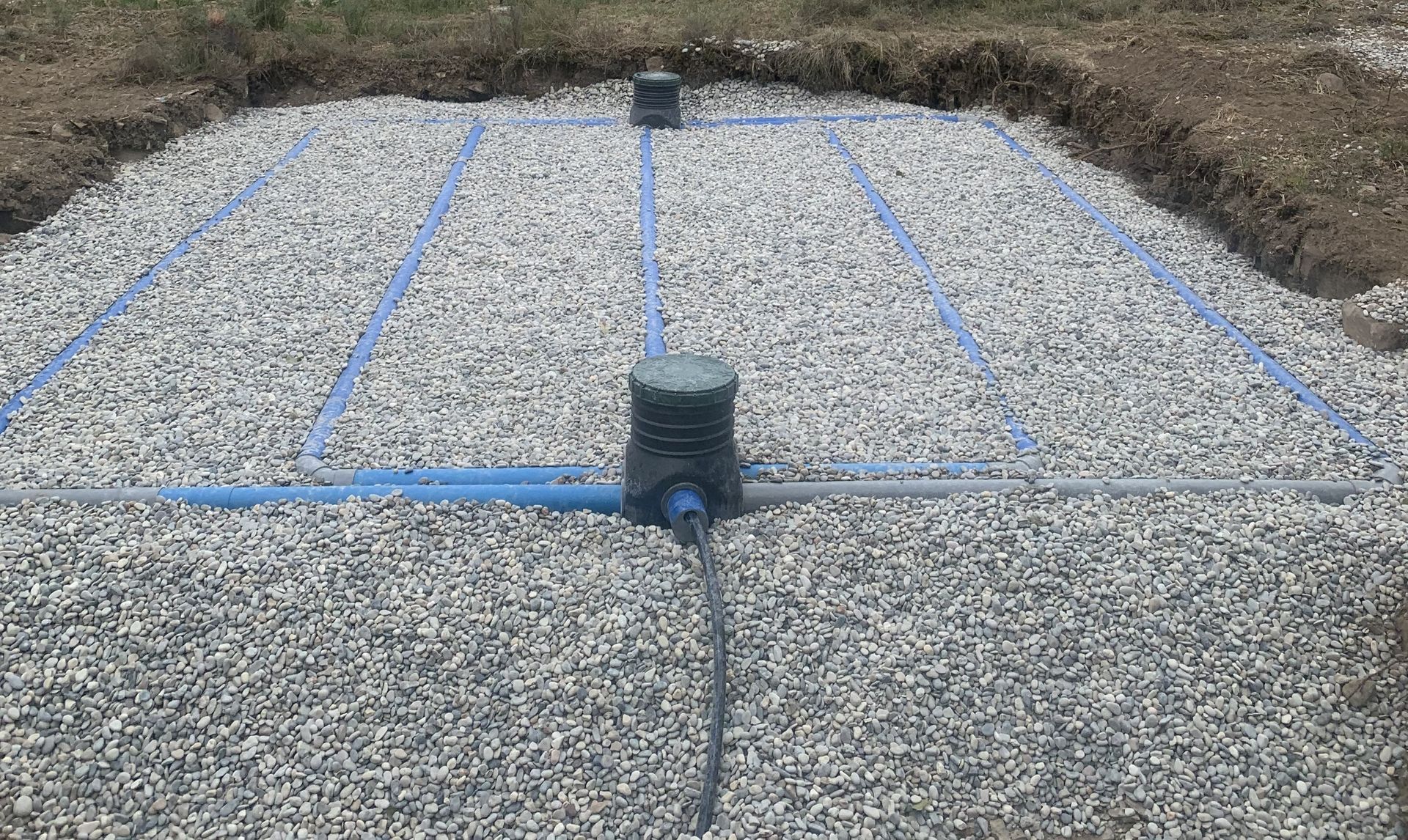 Zone d'épandage avec des tuyaux