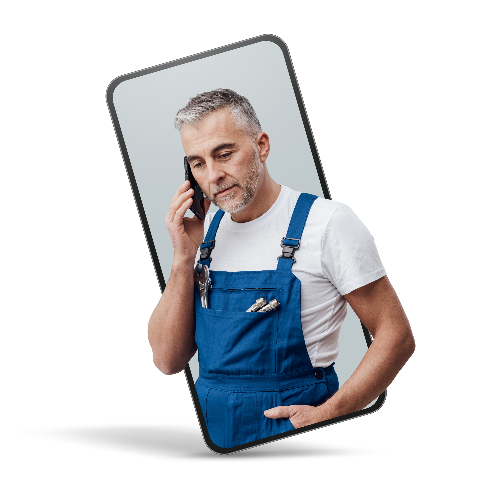 Plombier en train de téléphoner avec un smartphone.