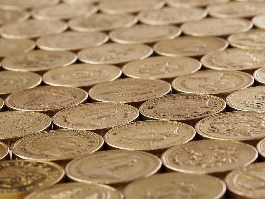 Pièces d'or alignées les unes à côté des autres