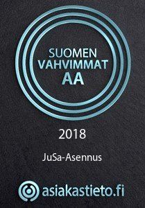 A 2018 Suomen Vahvimmat AA certificate logo for JuSa-Asennus against a dark textured background, from asiakastieto.fi.