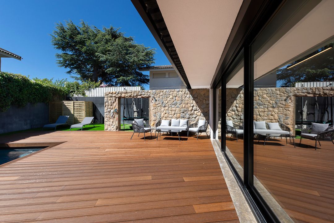 The pool terrace of a villa managed by Portugal Portfolio on the Estoril coast