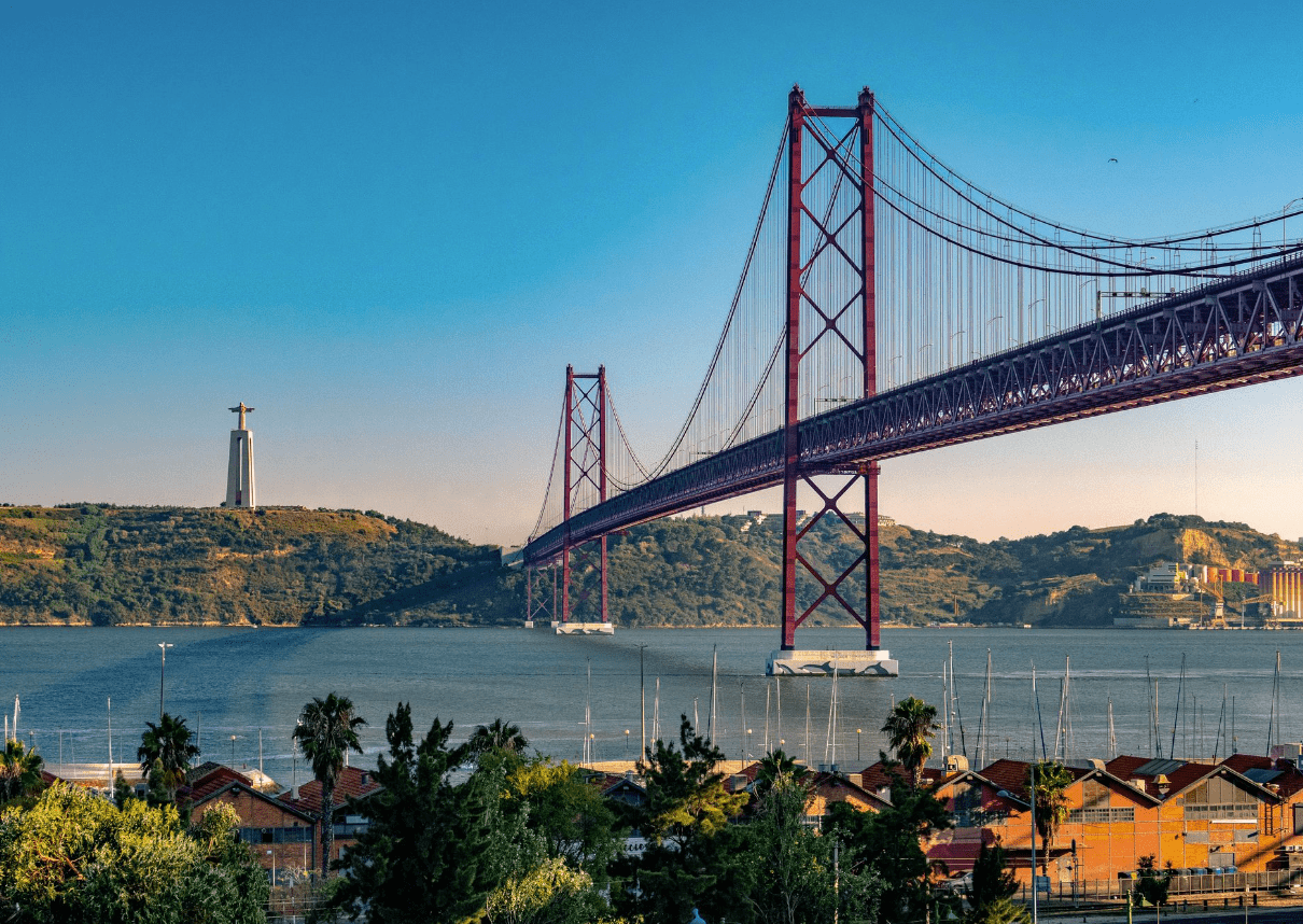 a large red bridge over a body of water
