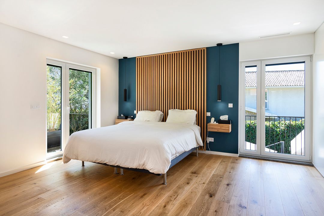 There is a large bed in the middle of the room.