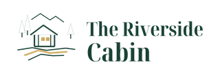 Logo for The Riverside Cabin with a cabin, trees, and mountains in muted green and orange.
