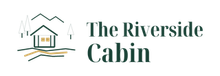 Logo for The Riverside Cabin with a cabin, trees, and mountains in muted green and orange.