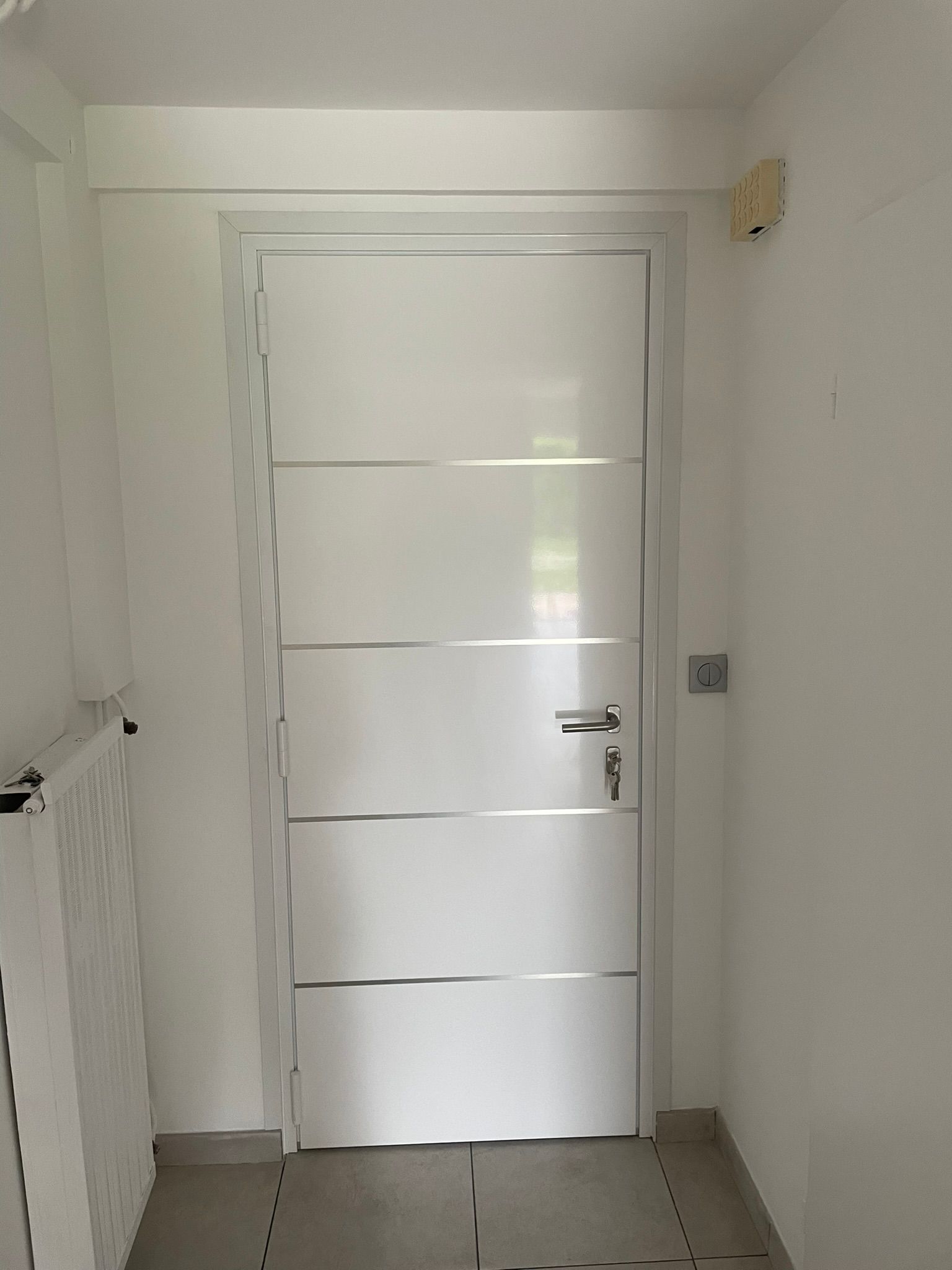 Une porte d'entrée sur mesure, vue d'intérieur