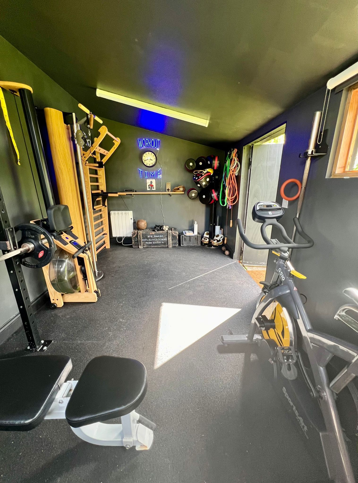 There is a bicycle in the middle of the room.