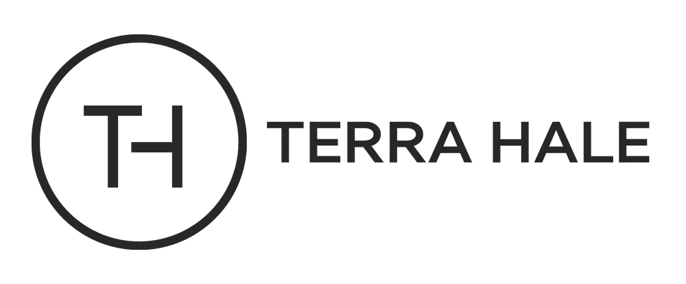The terra hale logo is black and white and looks like a helicopter.