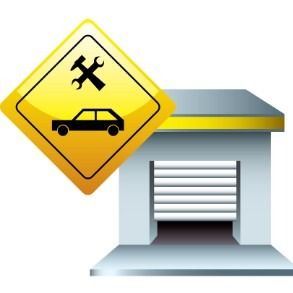 Un cartel amarillo con un coche y llaves inglesas.