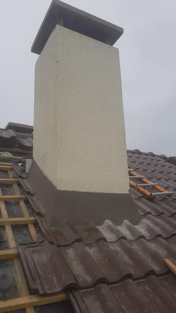 Travail de maçonnerie pour une toiture