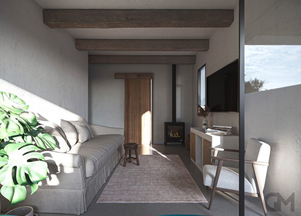 Una sala de estar con un sofá y una televisión.