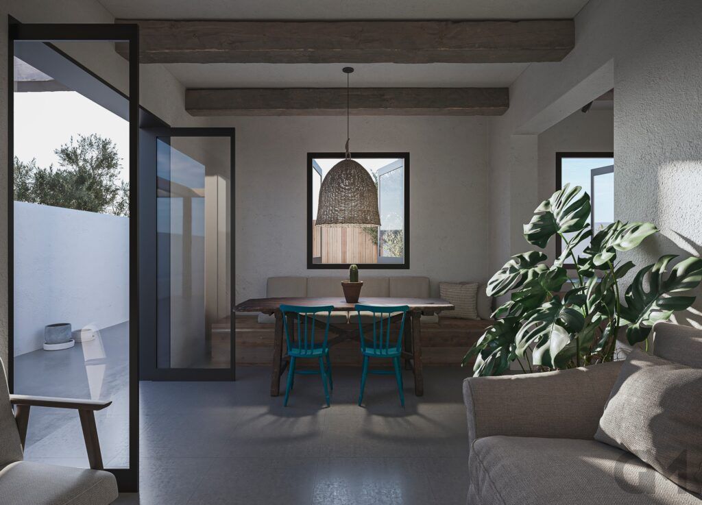 Una sala de estar con una mesa y sillas y un sofá.