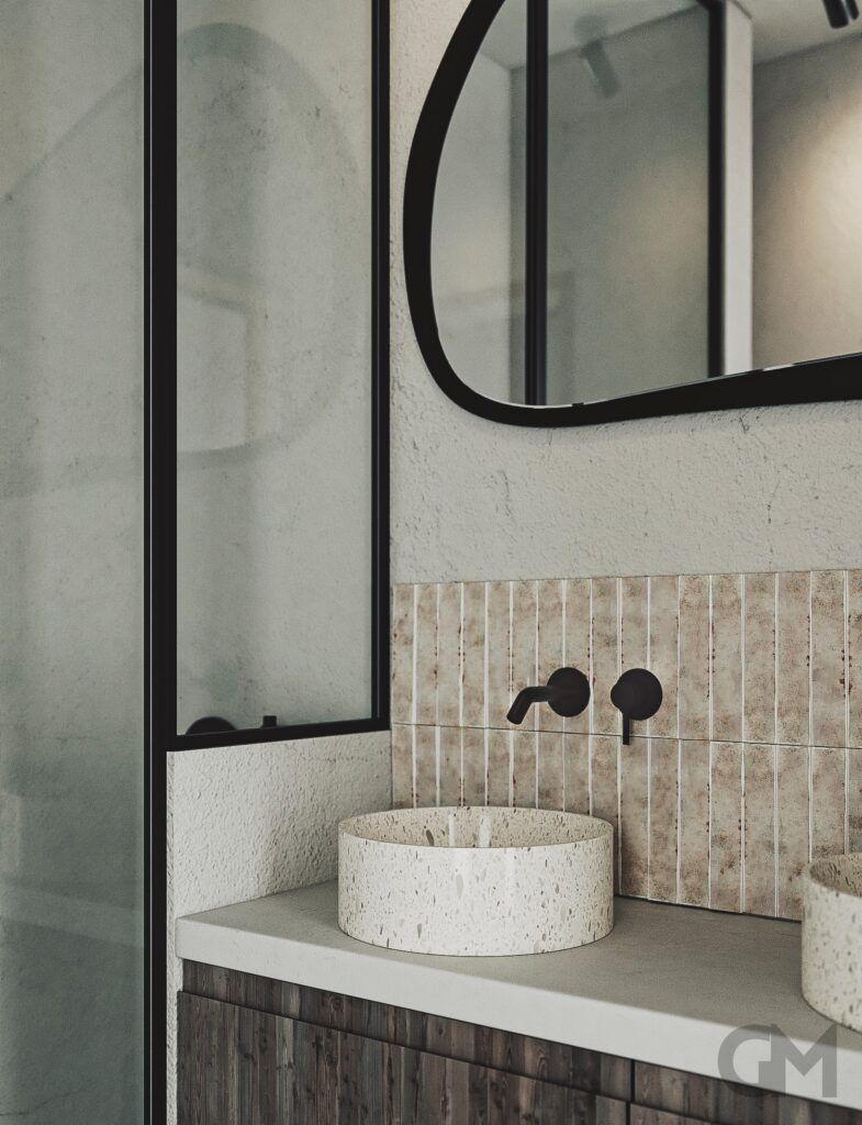 Un baño con un lavabo y un espejo en la pared.