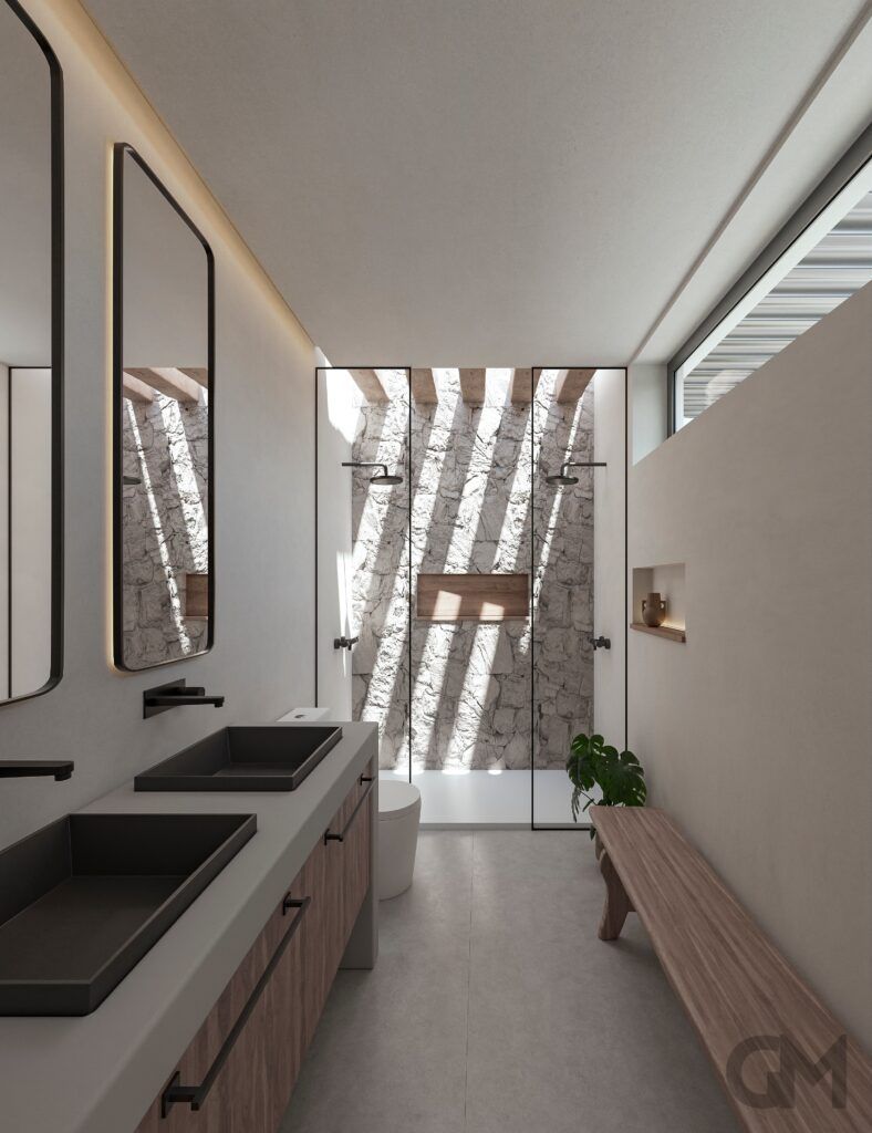 Un baño con dos lavabos y un banco.