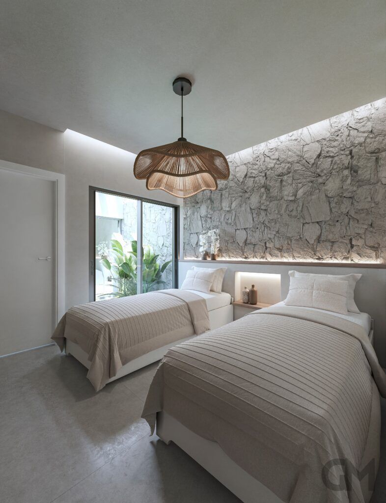 Un dormitorio con dos camas y una lámpara colgante.