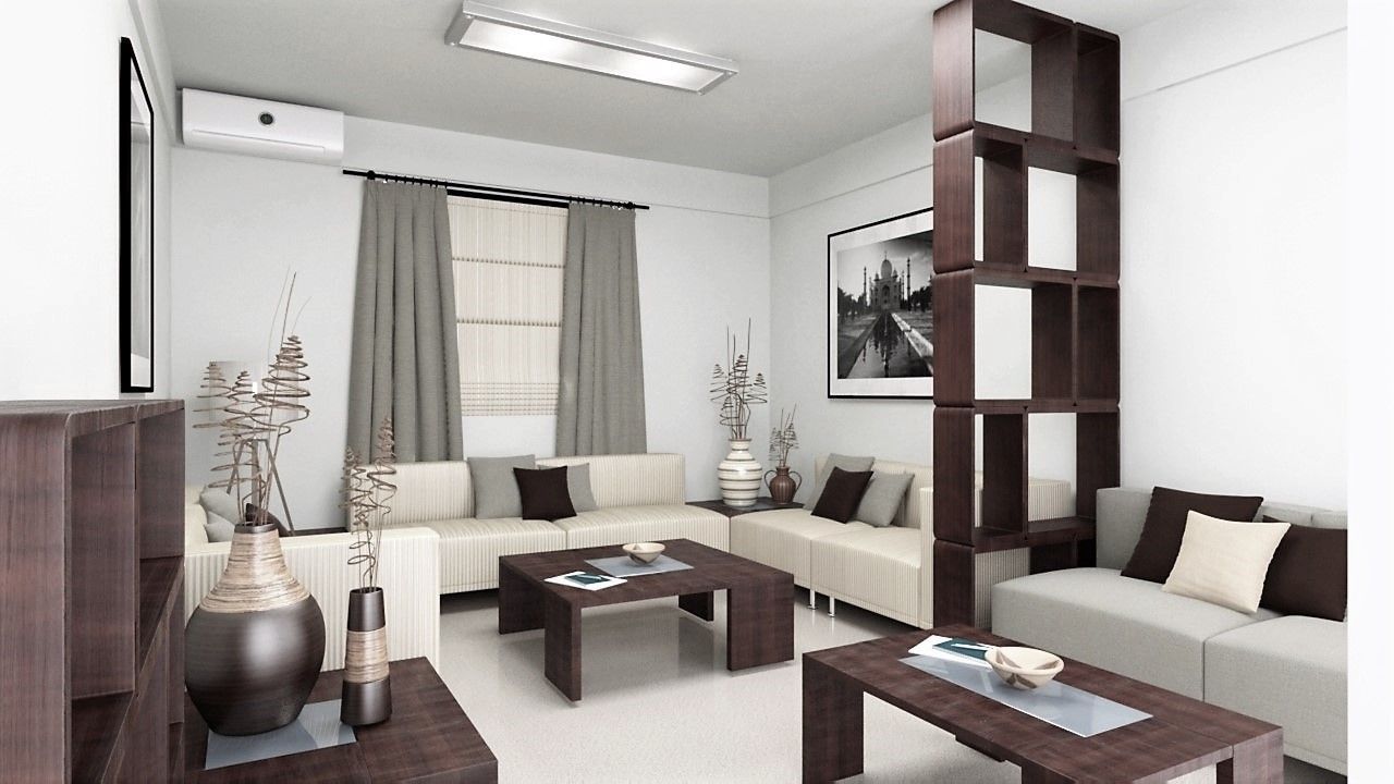 Sala de estar con sofás de colores claros, estanterías de color marrón oscuro y dos mesas de centro.