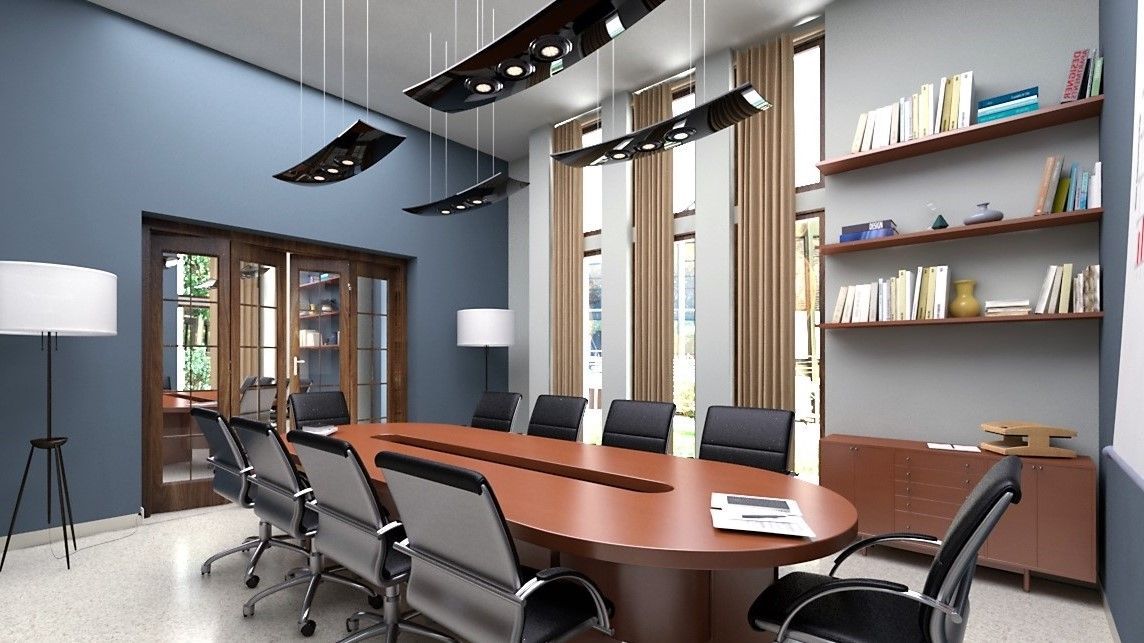 Una sala de conferencias con una gran mesa de madera, sillas y estanterías. Paredes azules, cortinas e iluminación moderna.