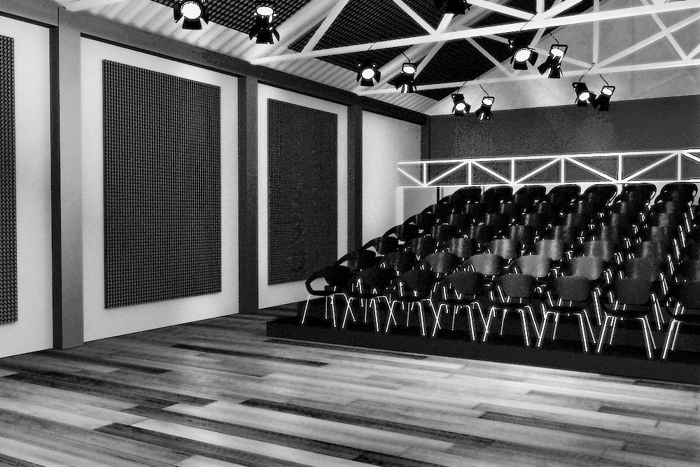 Un baño con dos lavabos y un banco.