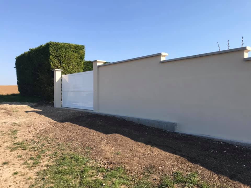 Création d'un muret, pose de portail en alu
