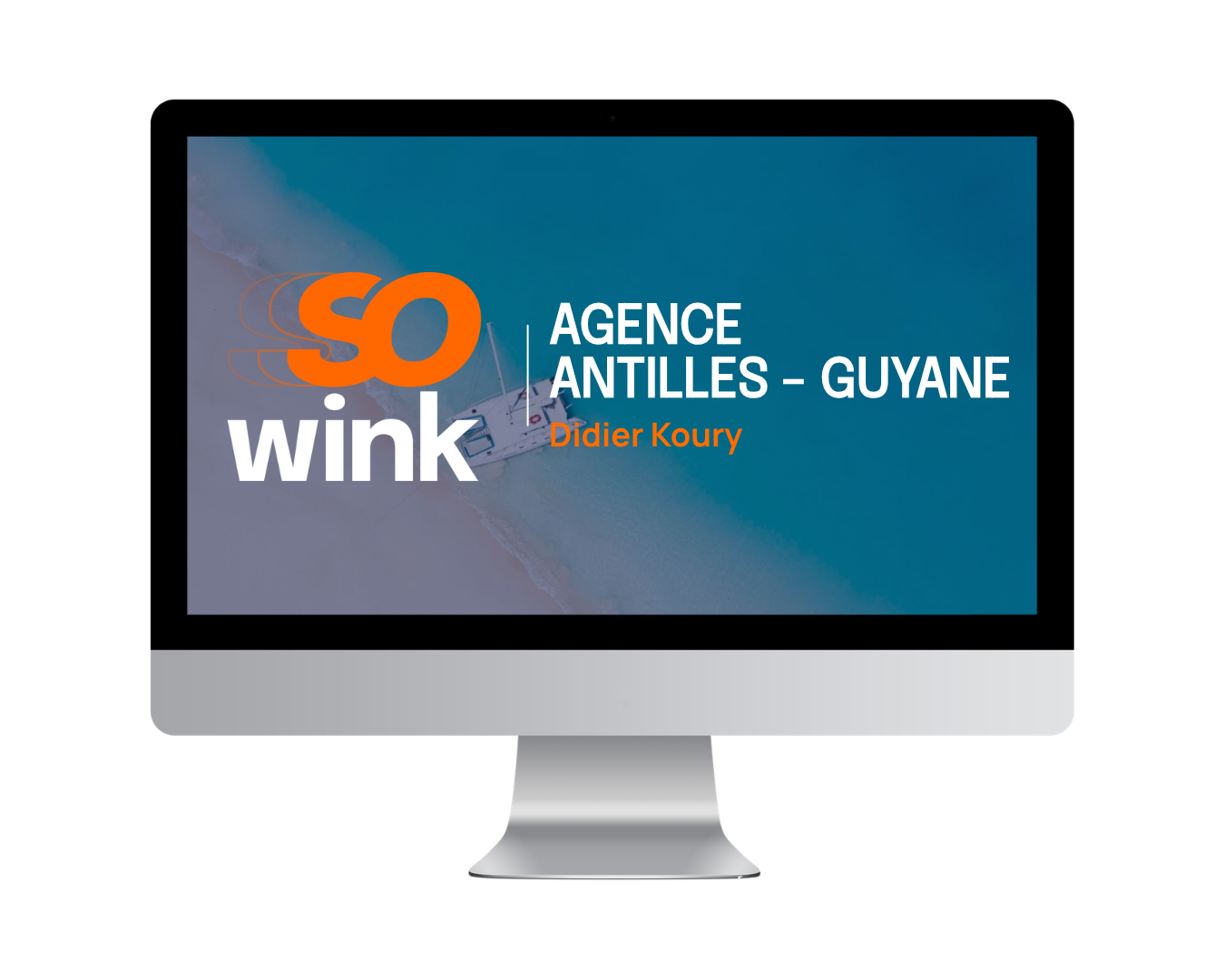 L'écran d'un ordinateur de bureau affiche le logo de « SO wink », intitulé « Agence Antilles-Guyane », avec « Didier Koury » en dessous.