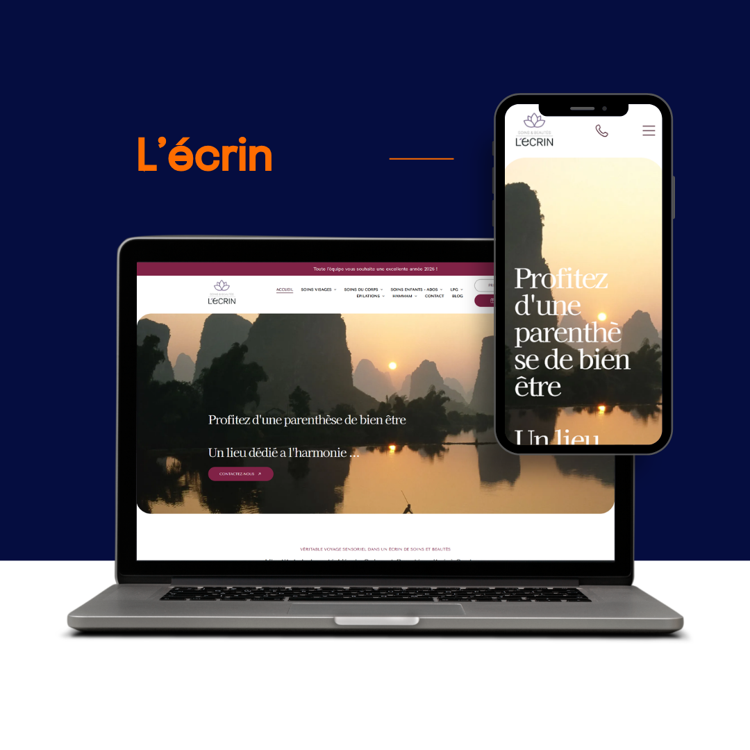 Un ordinateur portable et un smartphone affichant le site web « L'écrin » présentant un paysage serein au coucher du soleil.
