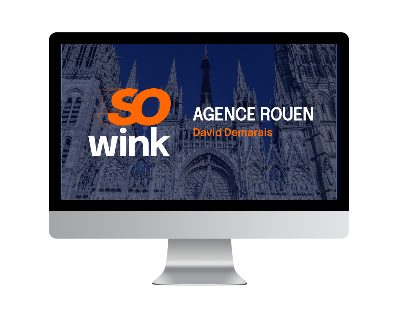 Un écran d'ordinateur affichant une diapositive de l'agence « So Wink » pour Rouen, avec en arrière-plan une cathédrale bleu foncé.