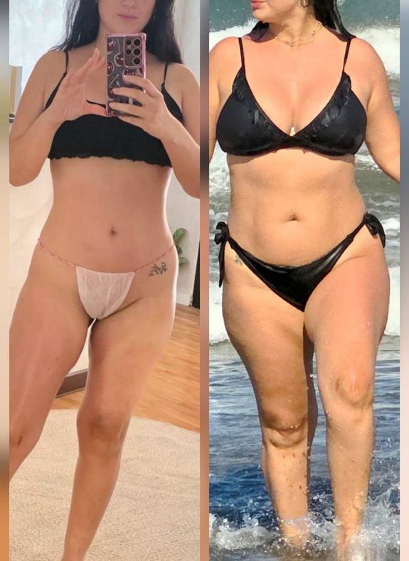 Mujer posando con top burdeos, pantalones cortos negros y medias, sosteniendo un objeto con forma de pretzel sobre un fondo oscuro.