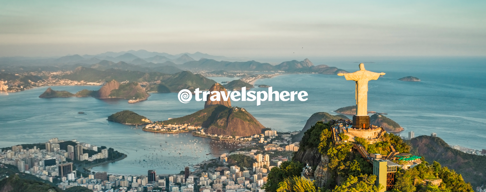 Rio de Janeiro coastline with Christ the Redeemer overlooking the city and bay at sunset. Travelsphere logo overlaid on top