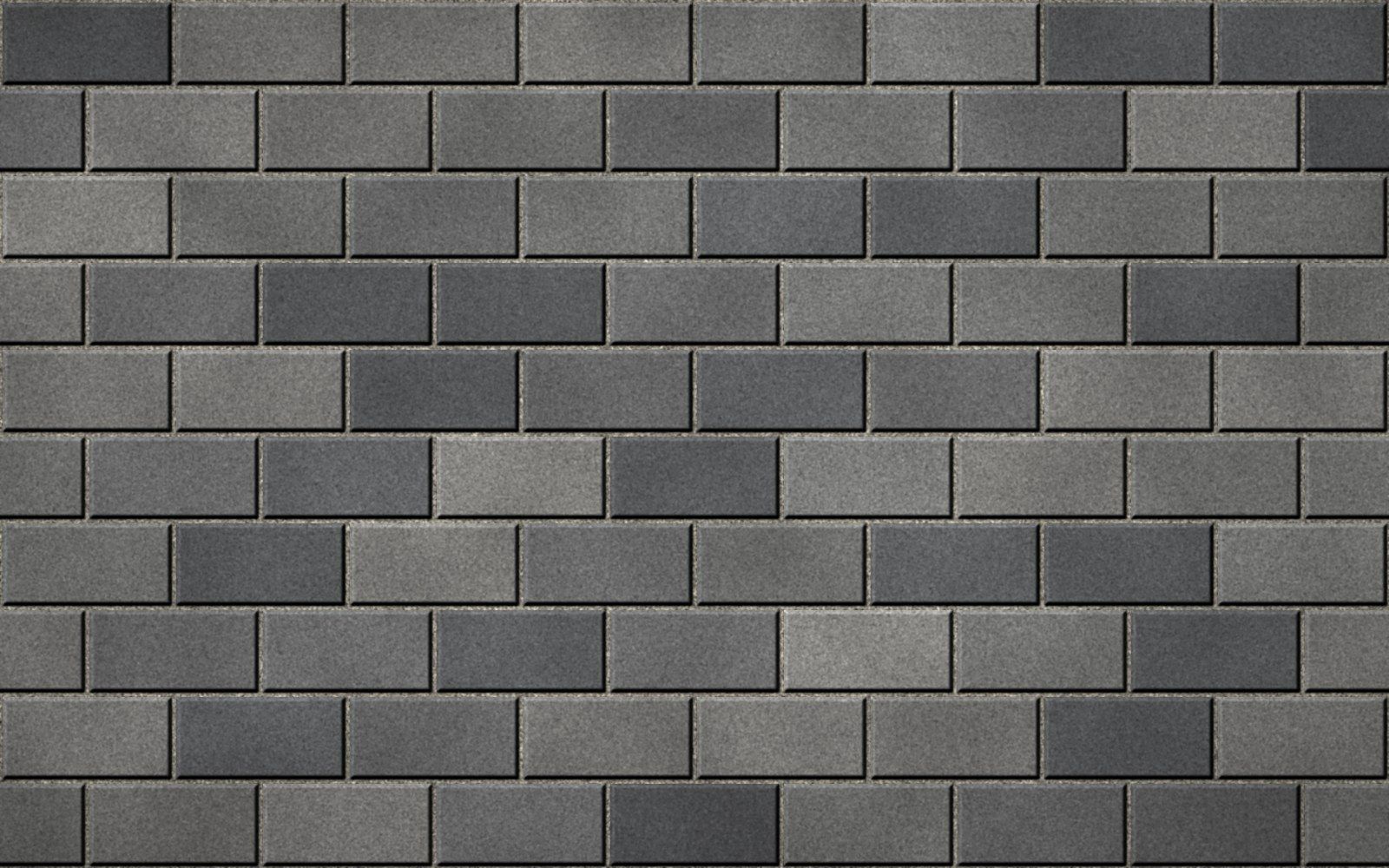 Betonsteinpflaster in Grau und Anthrazit im Läuferverband