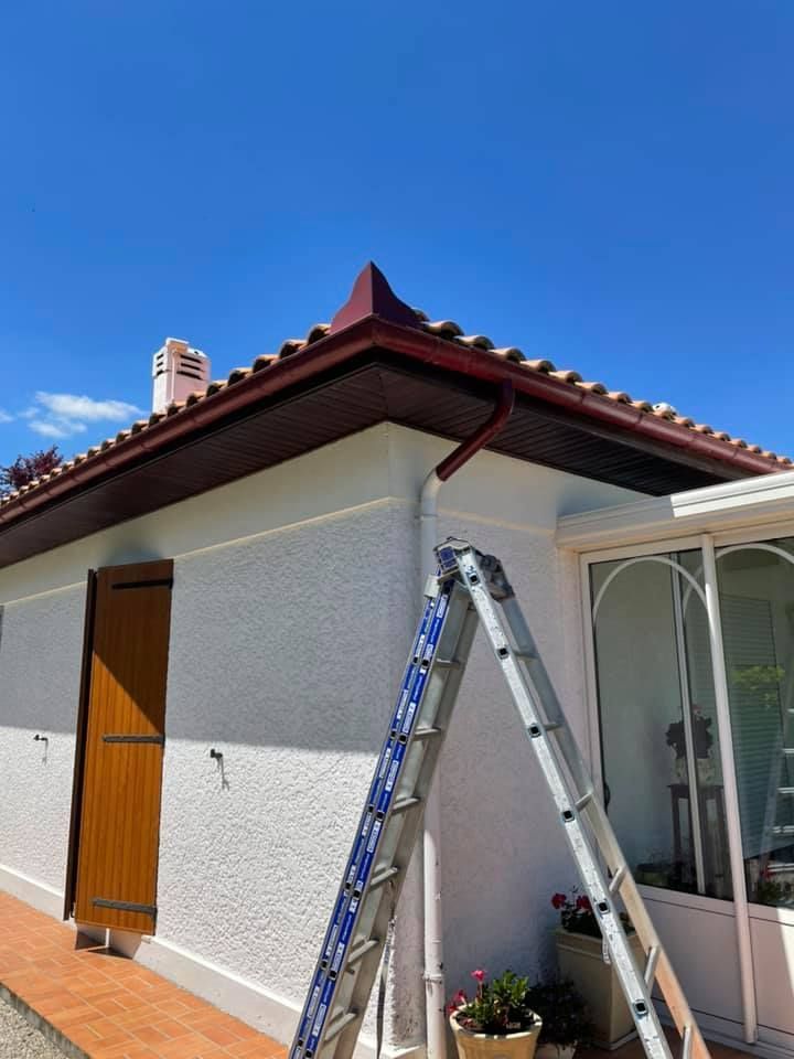 Pose de gouttières et descente en aluminium