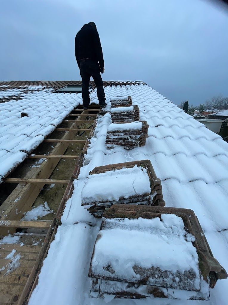 Rénovation de toiture sous la neige