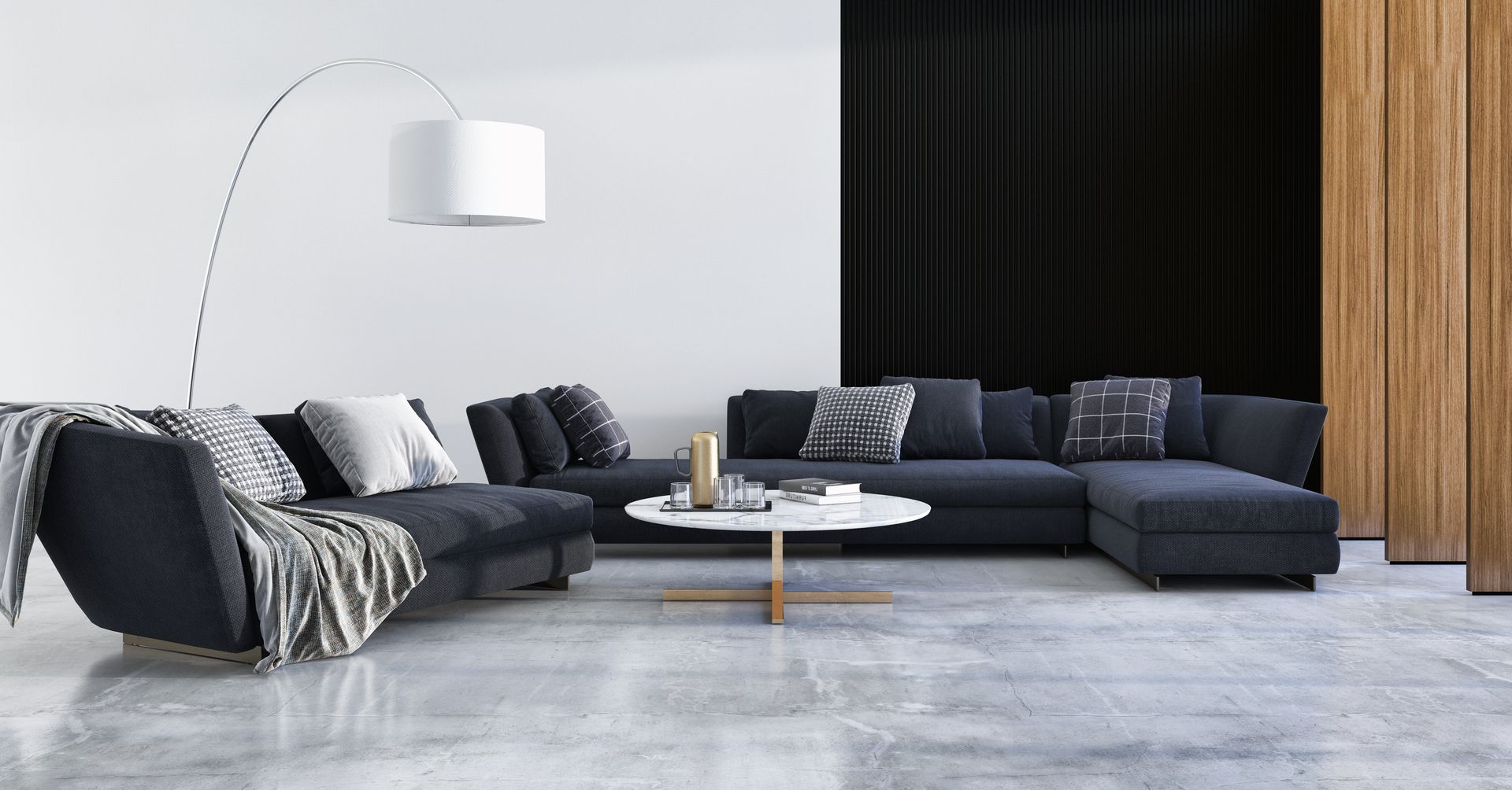 Salon moderne avec canapé d'angle bleu, table basse en marbre et lampadaire arqué.