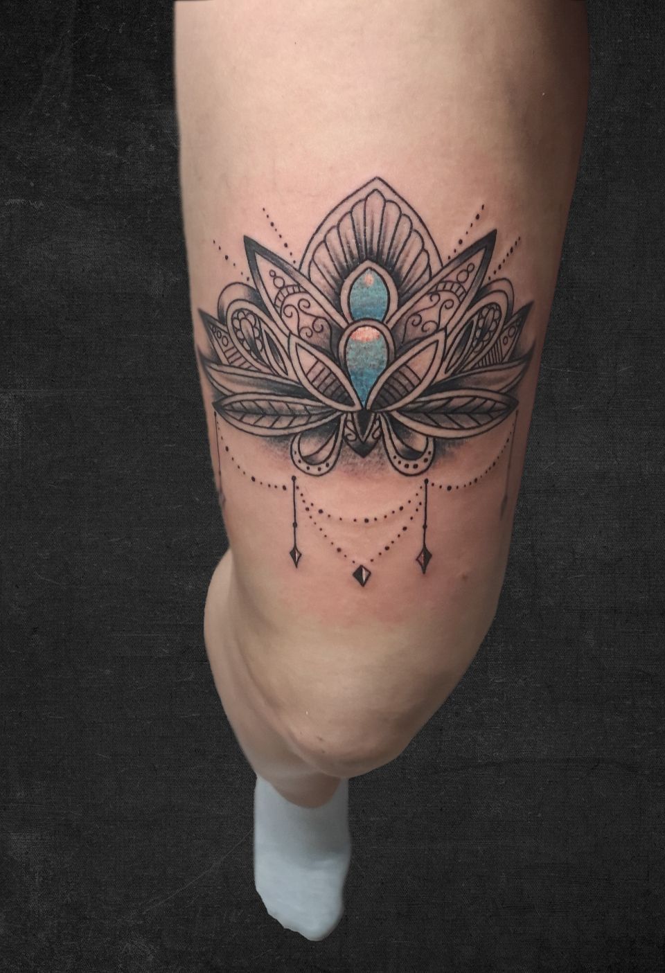 Tattoo am Oberschenkel