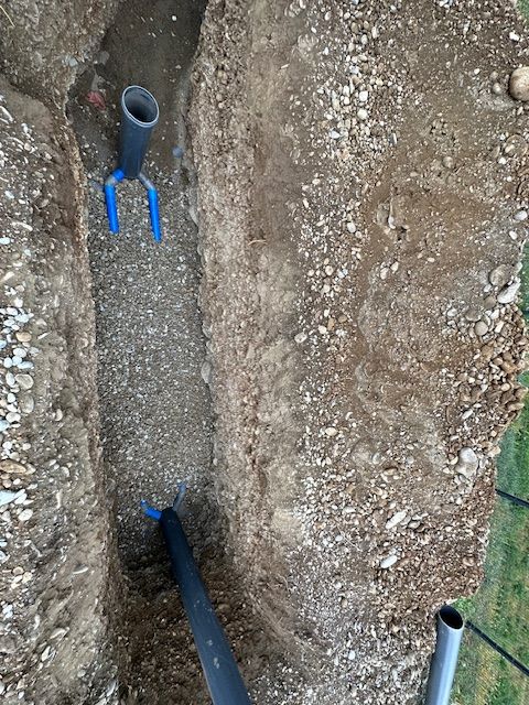 Tuyau de PVC gris enterré