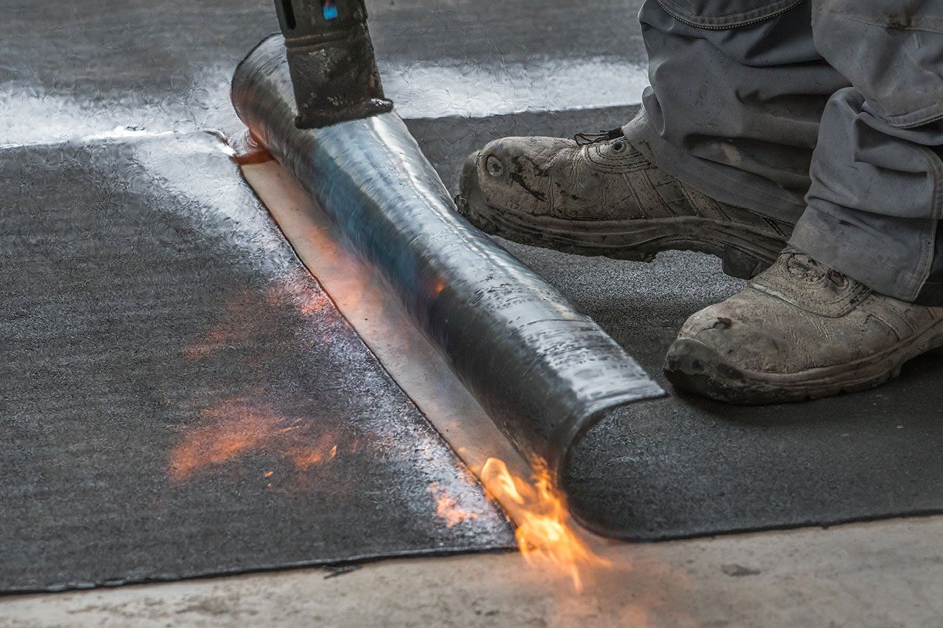 Installation d'une membrane d'étanchéité bitumeuse
