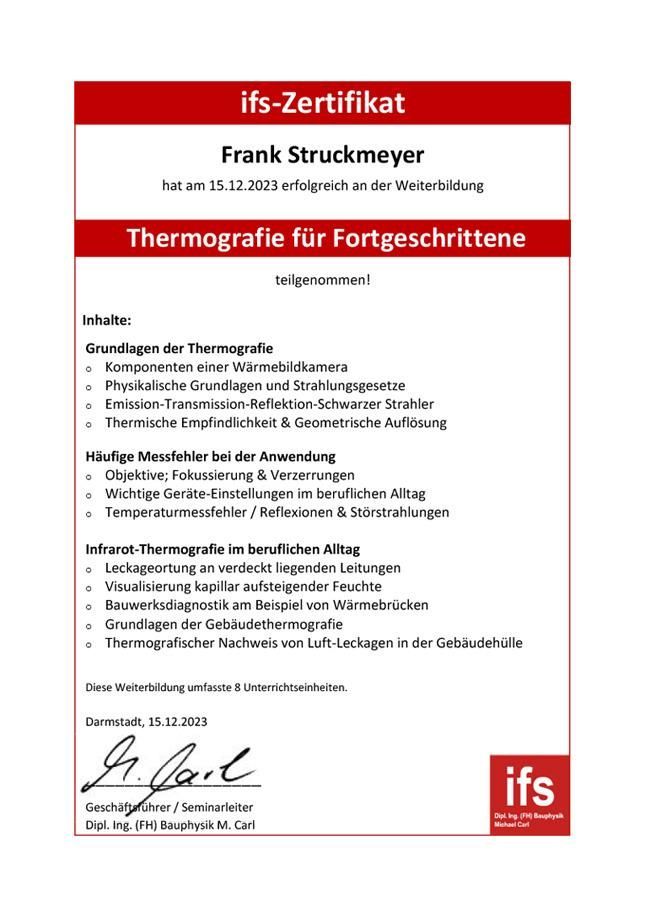 Eine rot-weiße Urkunde mit einer Unterschrift darauf.