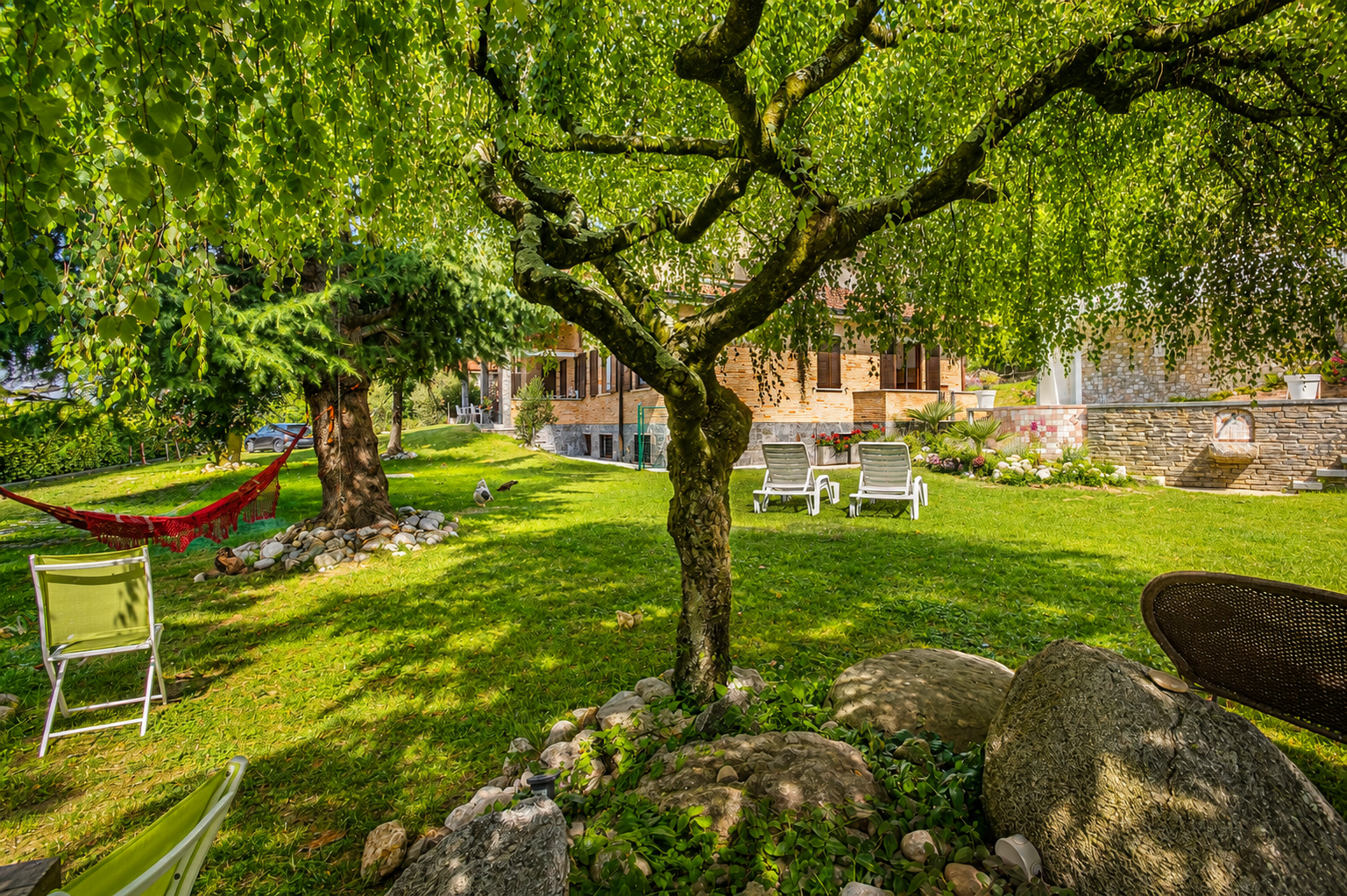 Outdoor seasonal swimming pool and garden at Villa Cuore Lake Como