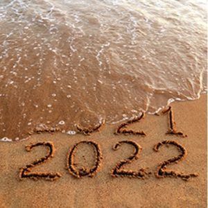 2022 written in sandy beach