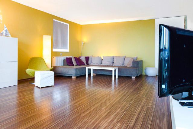 a living room with a couch and a television