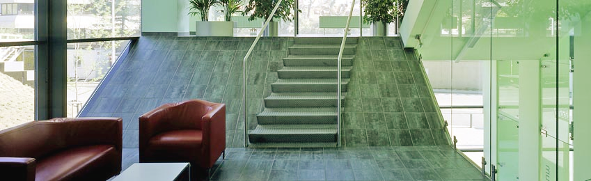 there are stairs leading up to the second floor of a building