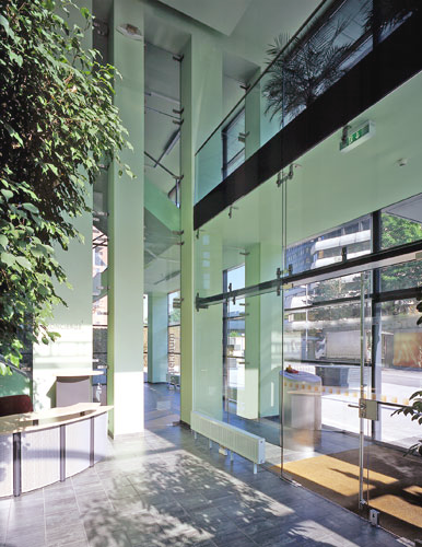 a large building with a lot of windows and columns