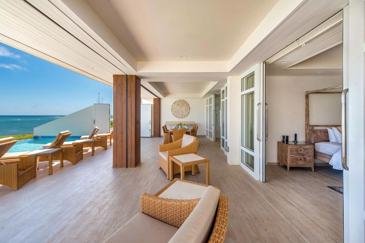 there is a large balcony with a view of the ocean