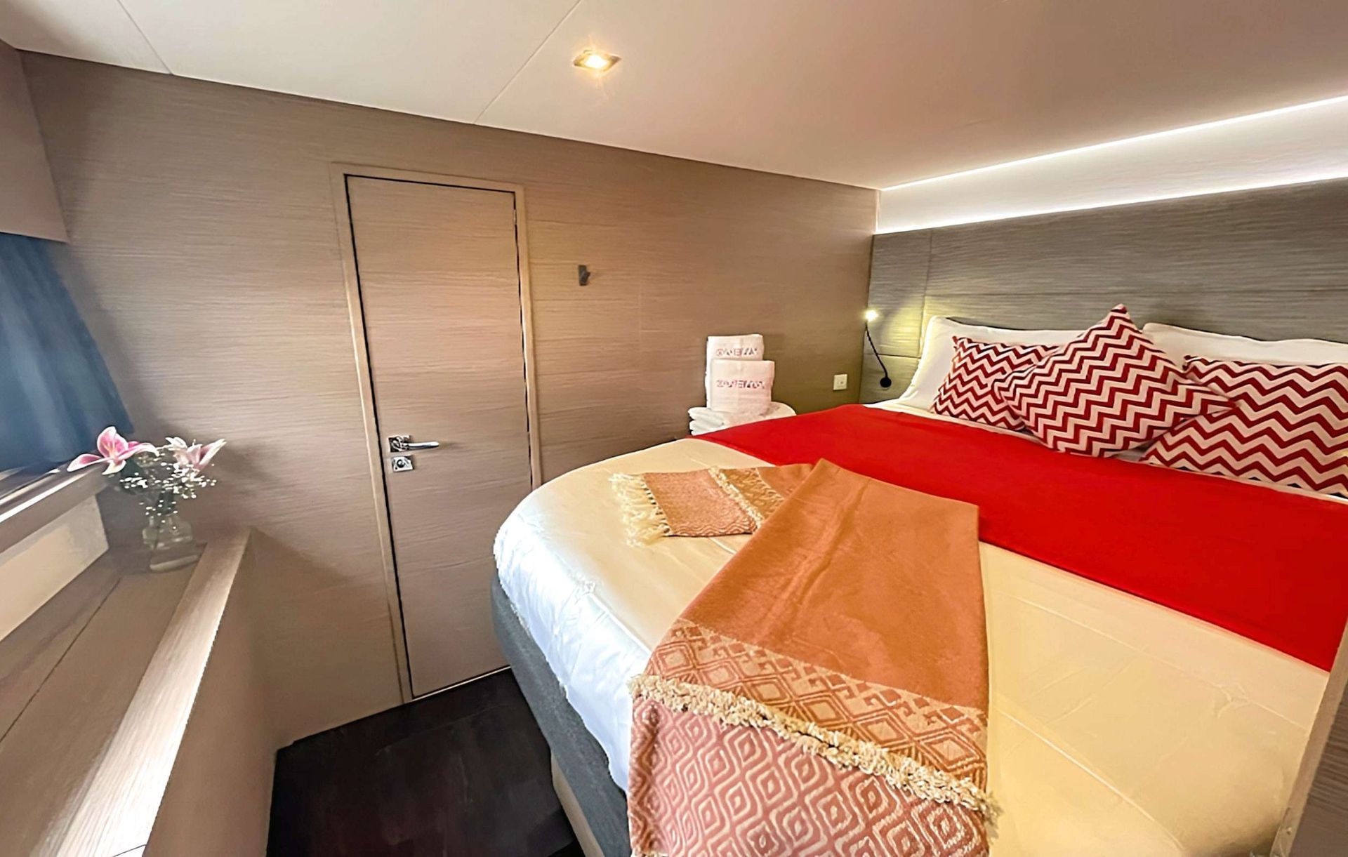 there is a large bed in the middle of the room