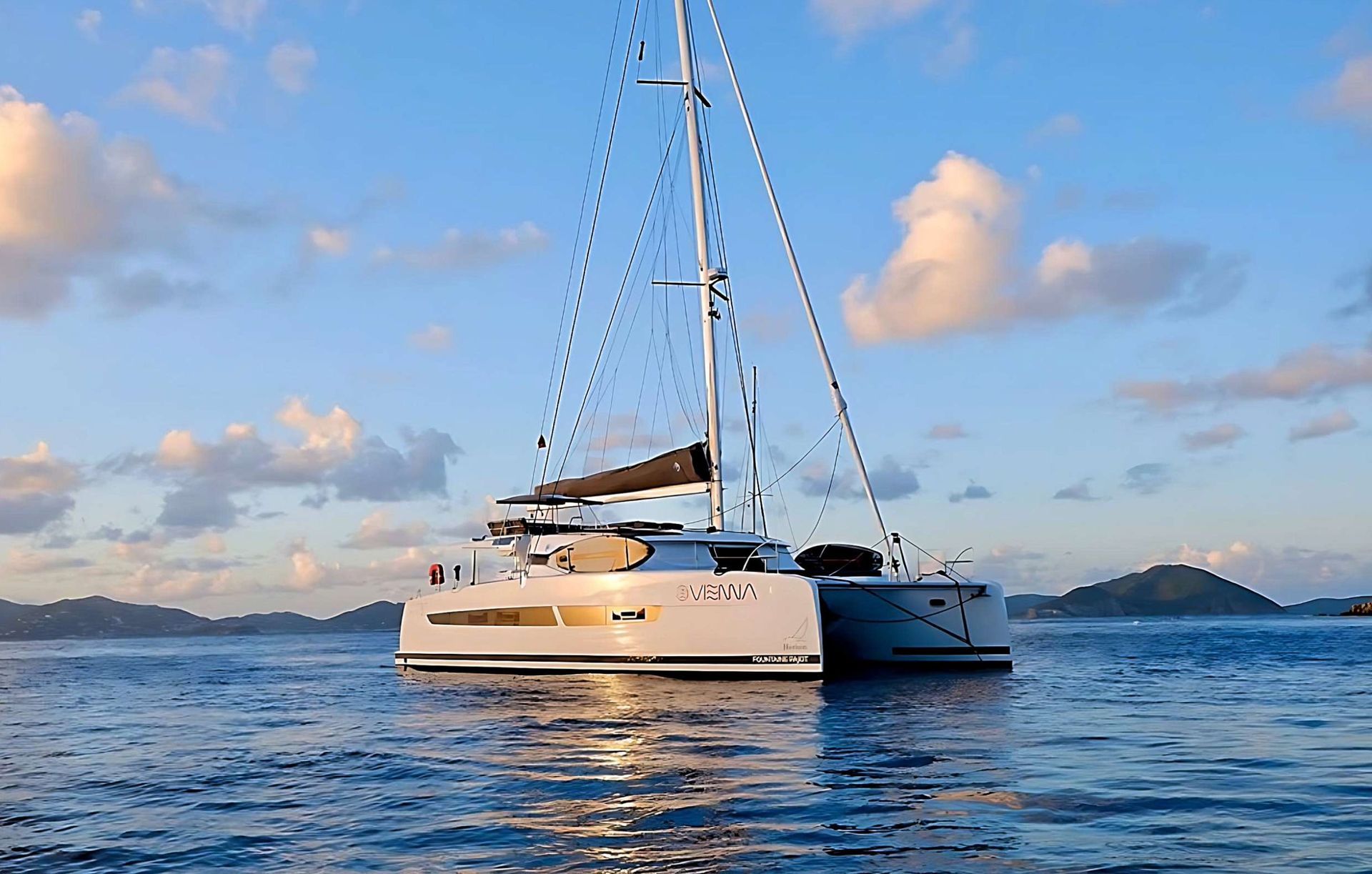 a sailboat is floating on top of a body of water
