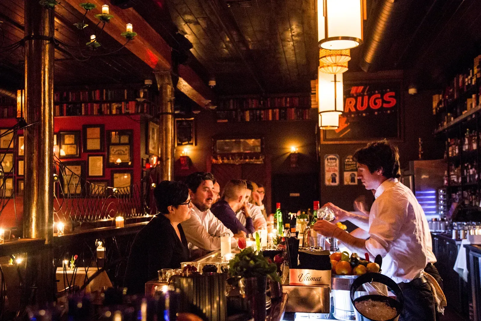 A bar with a sign that says rugs on it