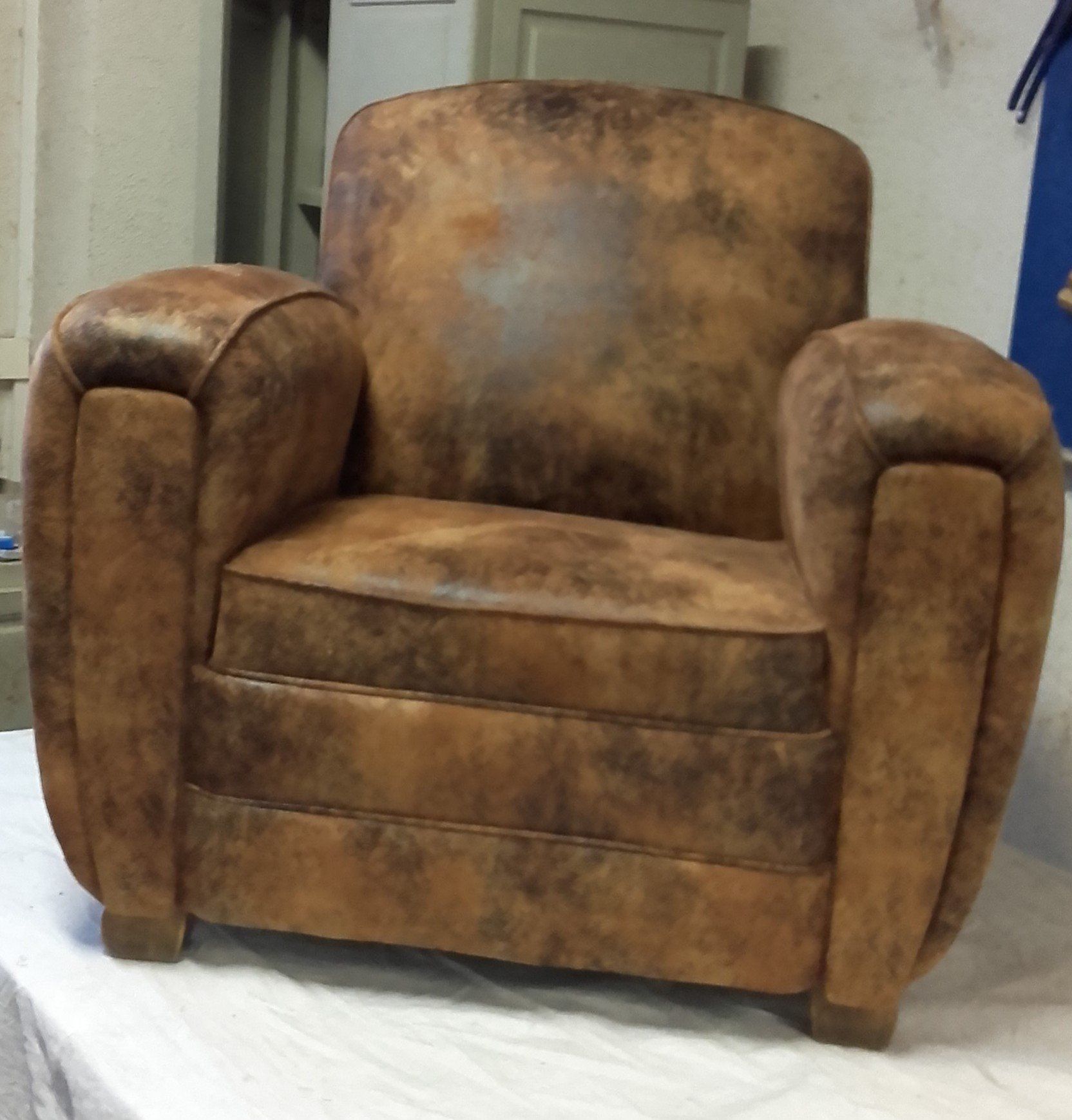 Ancien fauteuil en cuir