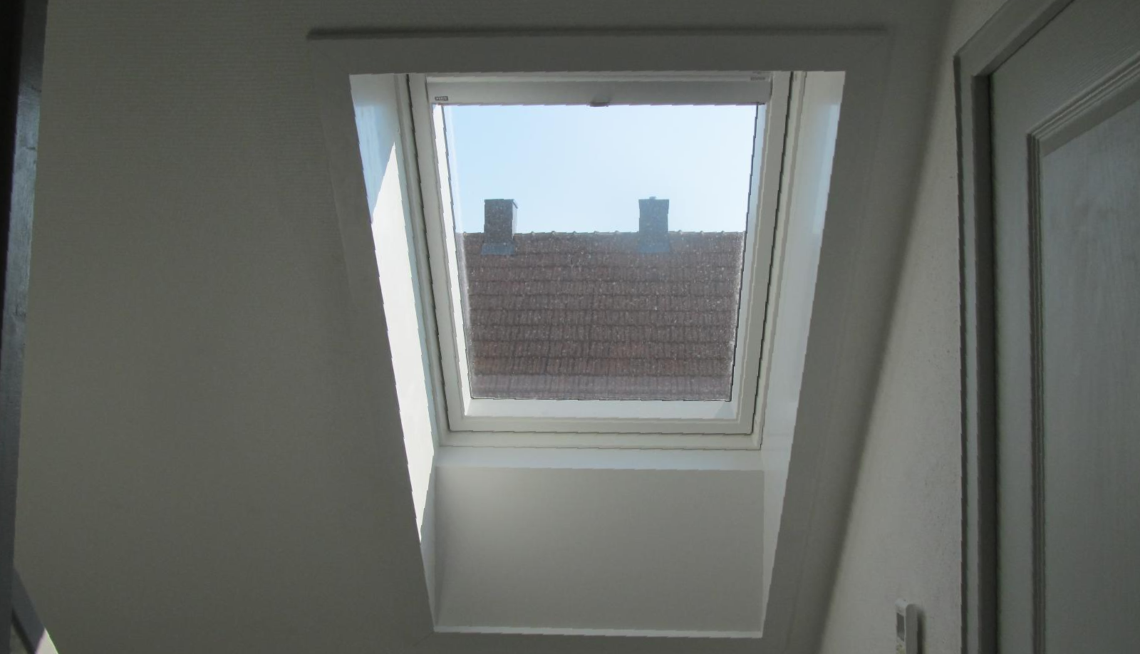 Pose de fenêtre de toit Pose de fenêtre de toit