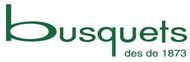 Logotipo de Busquets en texto verde, con &laquo;des de 1873&raquo; debajo