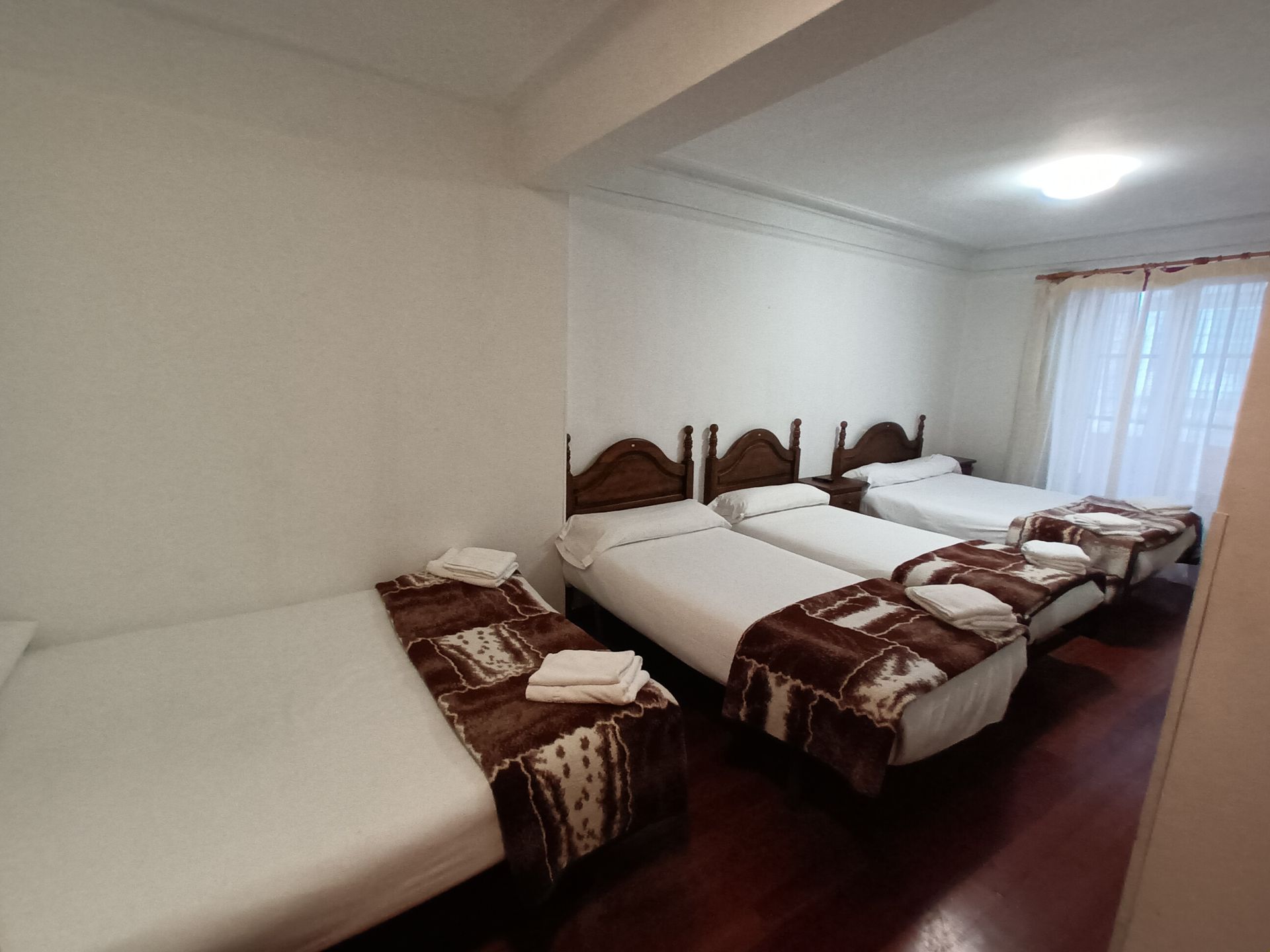 Habitación cuádruple con baño compartido